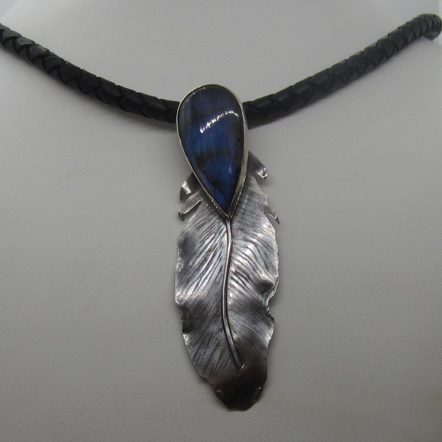 Blue hot sale feather necklace